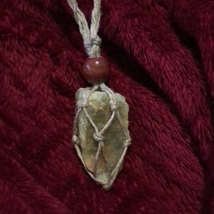 macrame wrapped aquamarine crystal